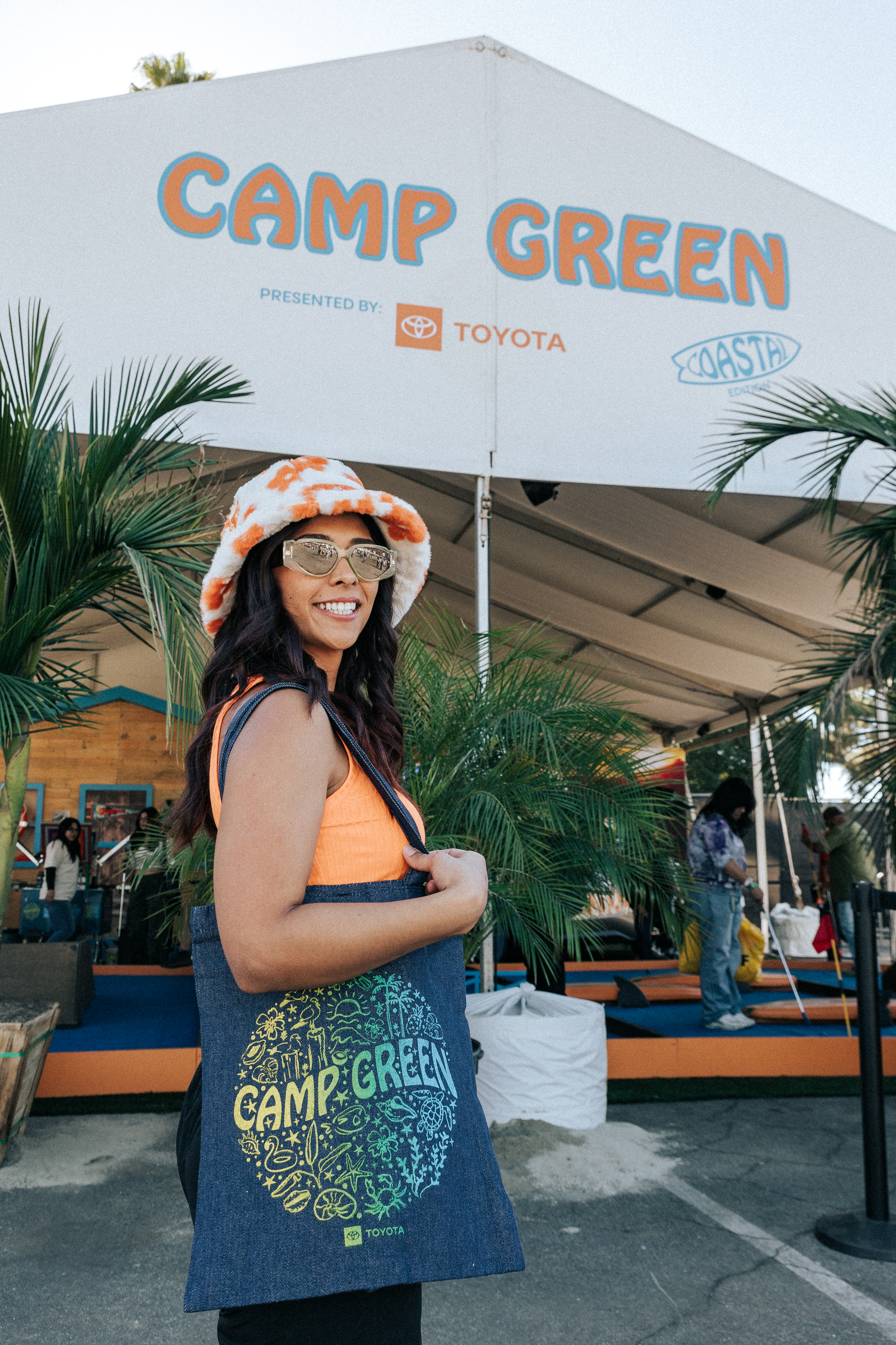 Portrait of a Camp Green guest in a bucket hat at the Toyota Prius activation