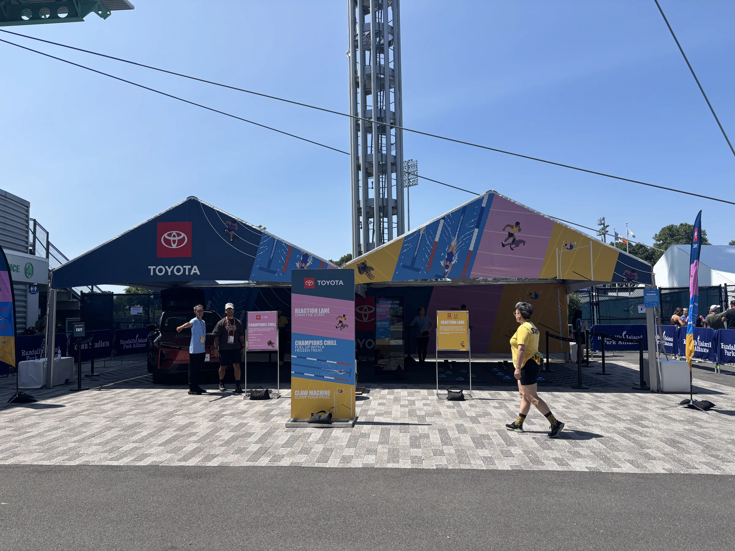 Toyota track activation footprint with printed canopies and banner system