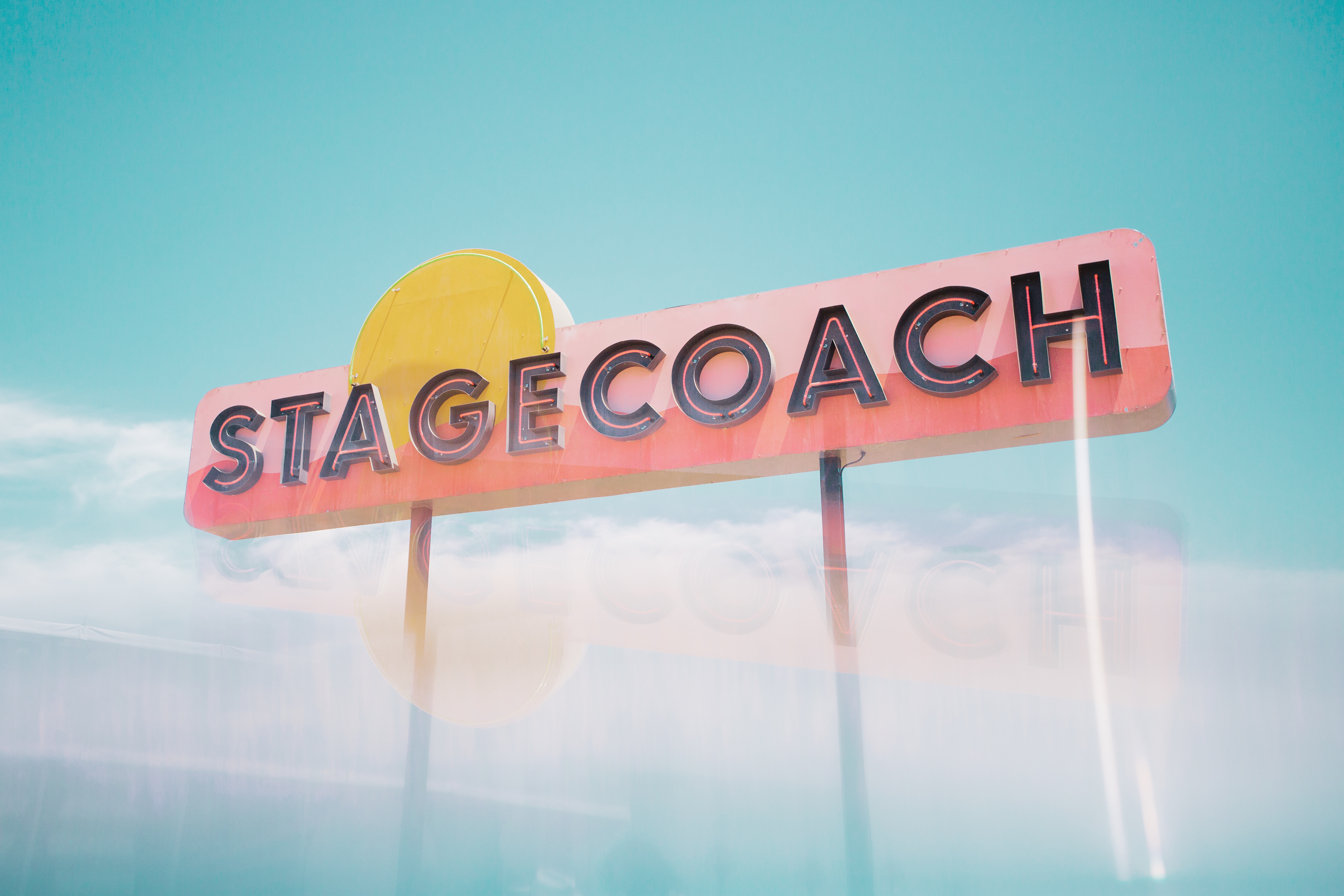 Stagecoach Festival entry sign at golden hour