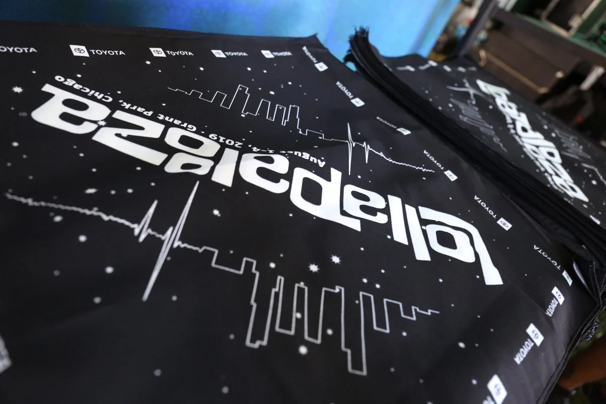 Lollapalooza flag with skyline artwork at the Toyota Music Den