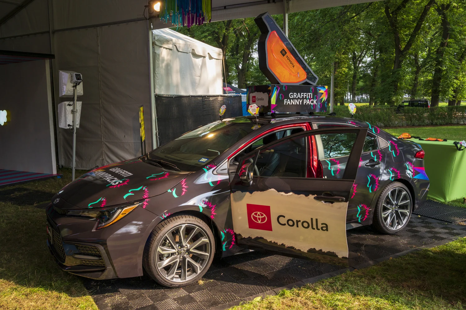 Toyota Sienna Car of the Future in a pink neon lit environment