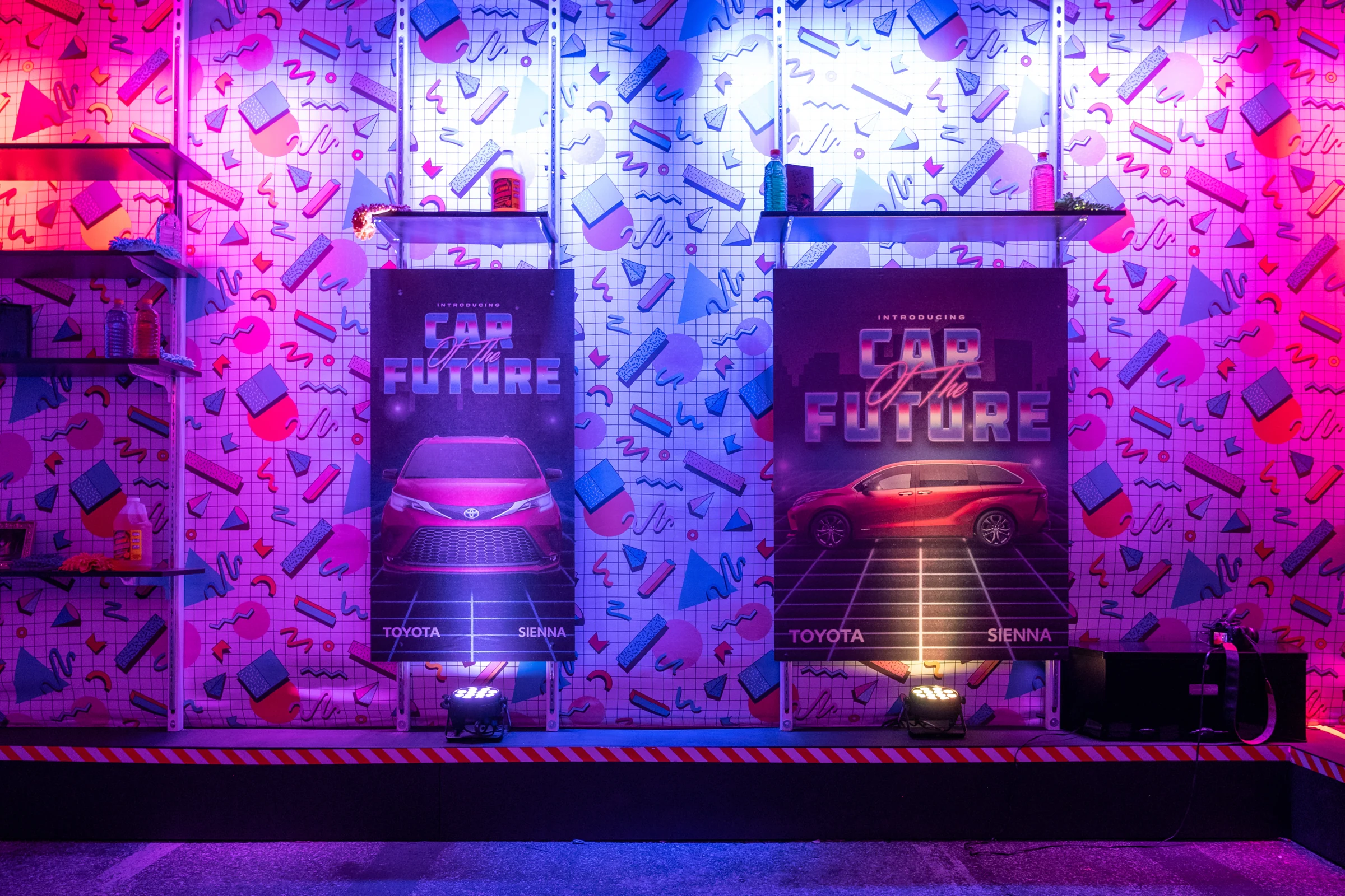 Car of the Future stage build lit in violet with geometric Memphis graphics